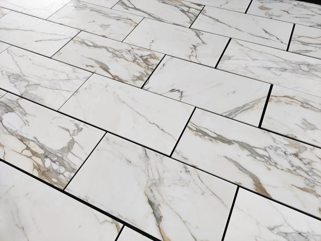 Calacatta Gold 18×36 inches marble tile finish comparison or secondary view.
