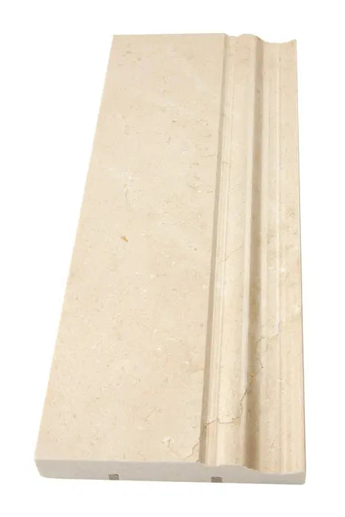 Crema Marfil marble 4¾×12 baseboard profile.