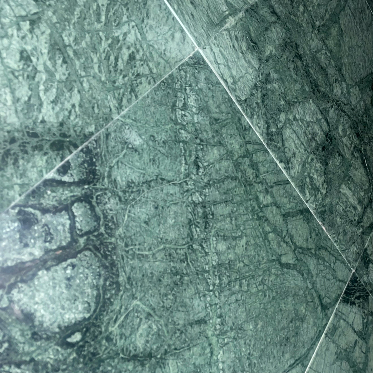 Bombay Green Marble 12×12 Tile with natural deep green with lighter green and white natural veining.
