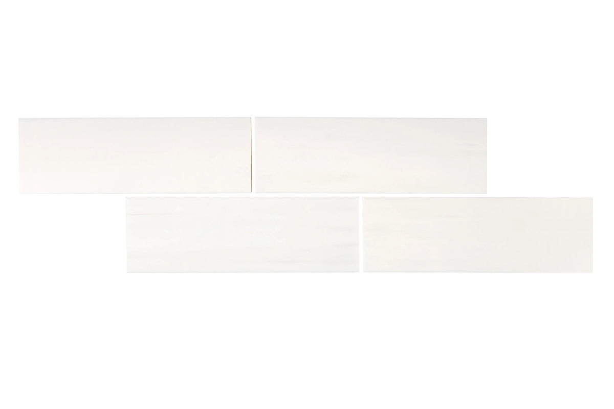 Bianco Dolomite 2×8 inches marble subway tile finish or layout view.