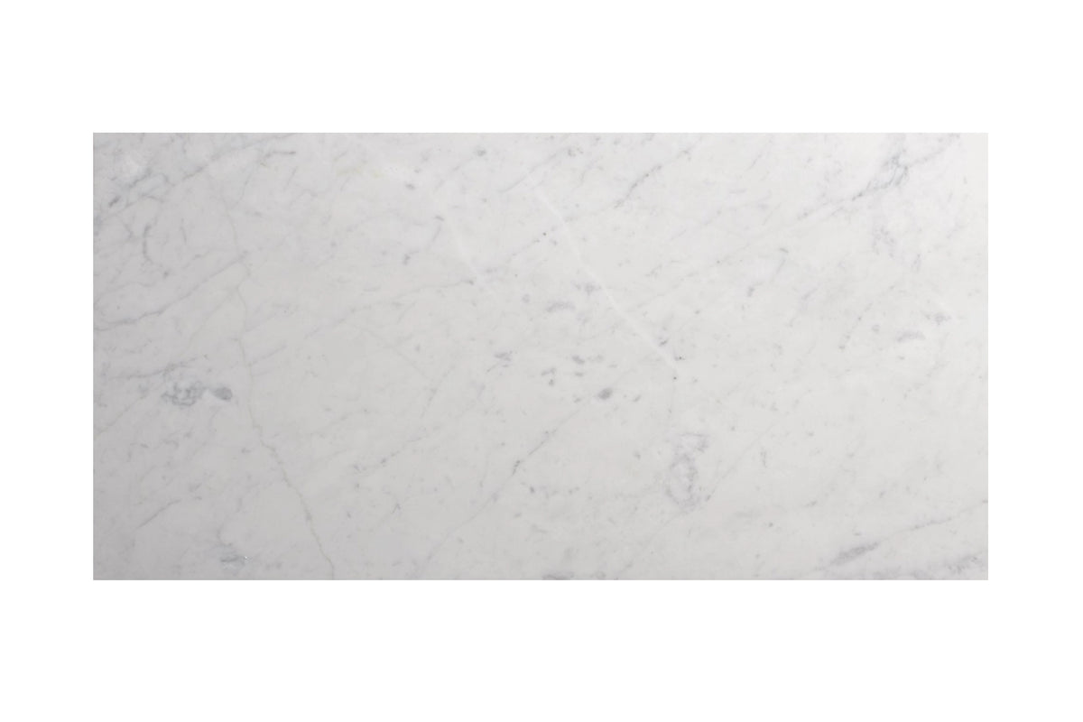 Carrara White Gioia marble 18×36 tile showing a soft white background with gray veining.