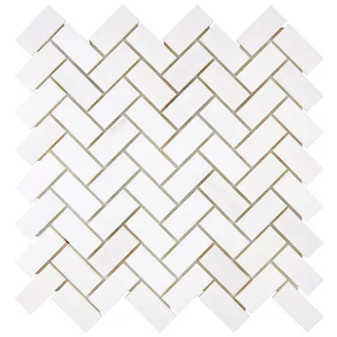 Bianco Dolomite polished 1×2 herringbone marble mosaic.