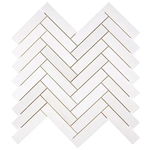 Bianco Dolomite polished 1×4 herringbone marble mosaic.