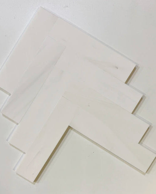 Bianco Dolomite 2×8 inches marble subway tile finish or layout view.