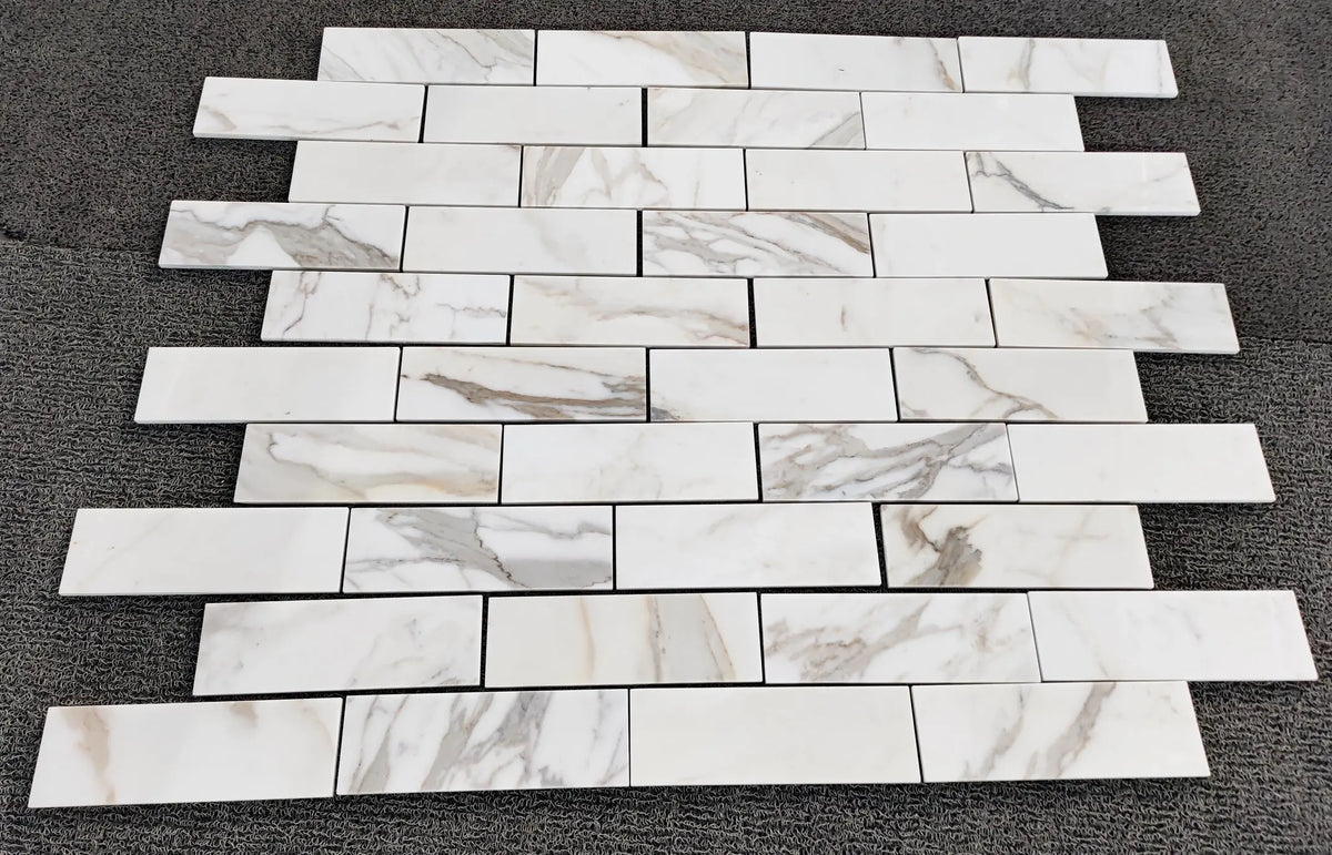 2×8 Calacatta Gold Brick pattern