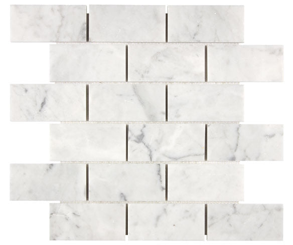 Carrara White Gioia marble 2×4 brick mosaic with a polished finish.