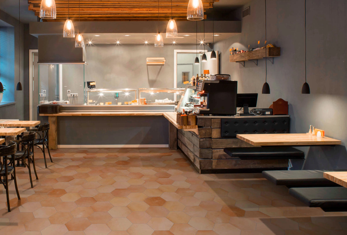Castellon Menorca Hex Cotto porcelain tile installed on a commercial restaurant floor.