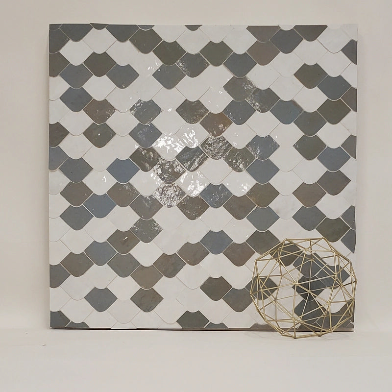 Handmade Moroccan Zellige Chouari mosaic with glossy star-and-diamond geometry.