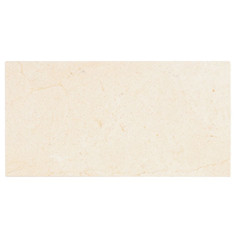 Crema Marfil marble 3×6 subway tile in a polished or honed finish.