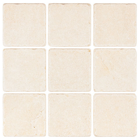 Crema Marfil marble 4×4 square tile with a tumbled finish.