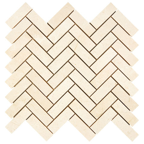 Crema Marfil polished 1×3 herringbone marble mosaic.