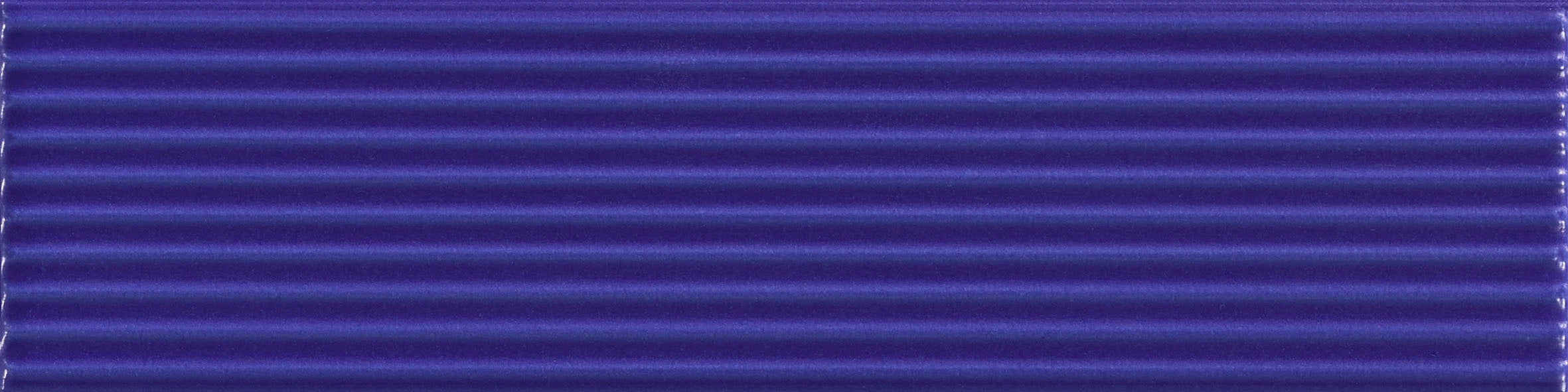 Rhythm Deep Azure Strata 2×8 ceramic wall tile.