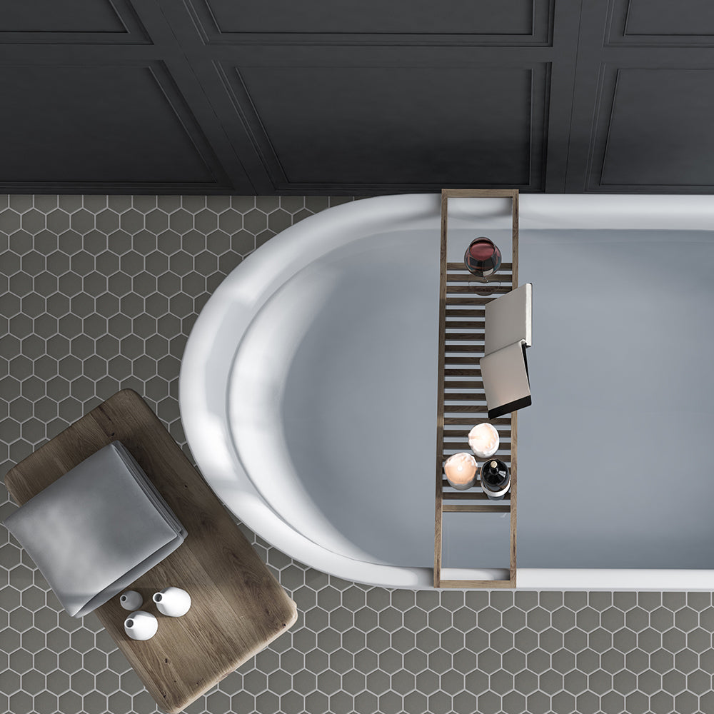 Foundry Iron hexagon porcelain mosaic installed on a contemporary bathroom floor.