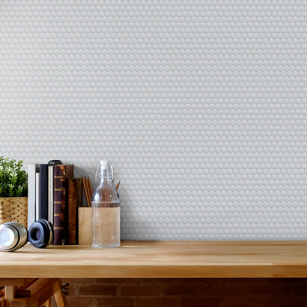Foundry Silver Mist penny-round porcelain mosaic installed in a contemporary interior.