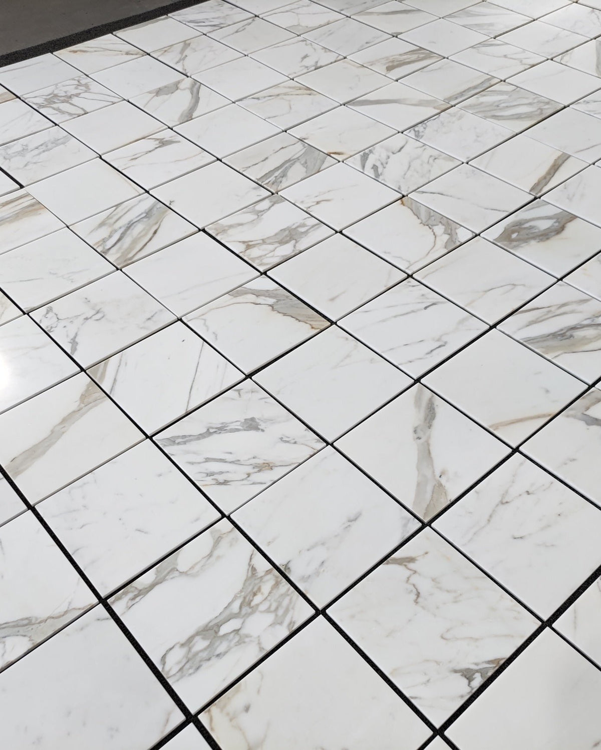 Calacatta Gold 12×12 marble tile, Available in honed or polished finish for sophisticated style