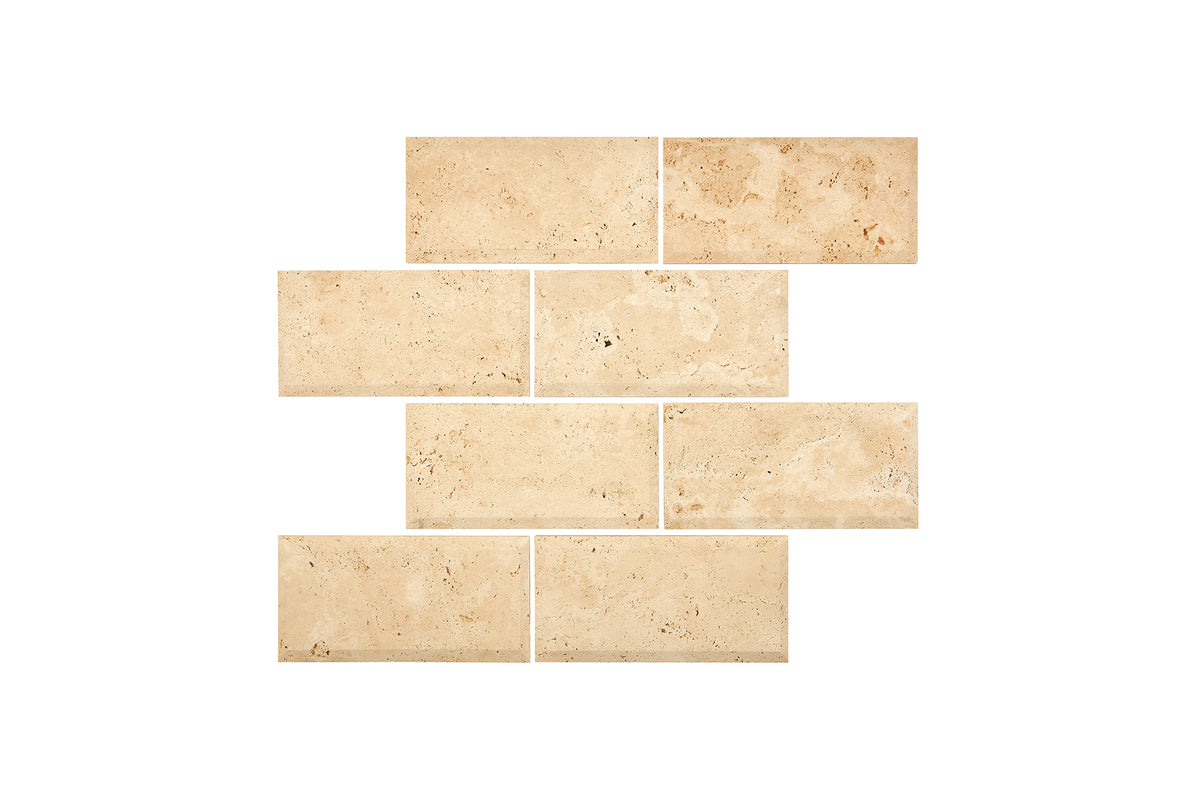 Ivory Travertine 3×6 subway tiles in a honed finish, warm ivory-beige natural stone.