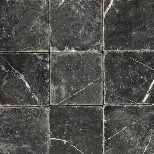 Nero Marquina marble 6×6 square tile with a tumbled finish.