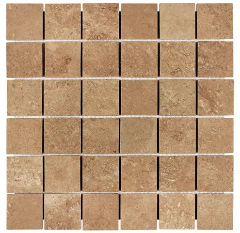 Noce Travertine 2×2 honed-and-filled mosaic with a smooth warm brown surface.