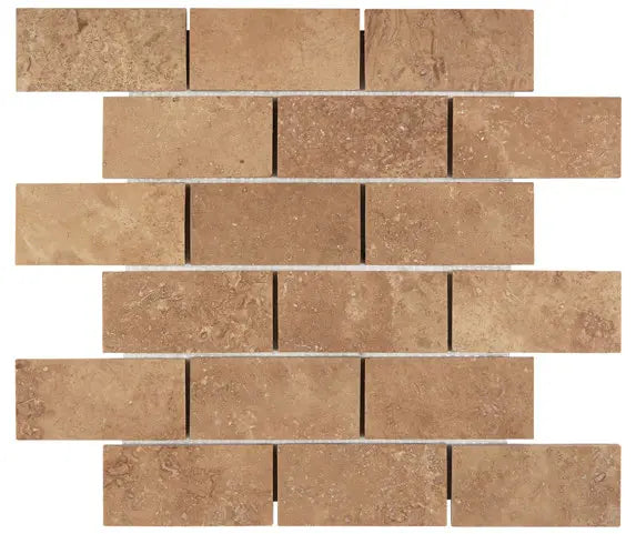 Noce Travertine 2×4 honed-and-filled mosaic with a smooth warm brown surface.