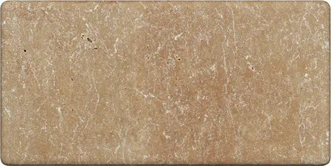 Noce Travertine 3×6 tumbled tile with softened edges and rustic brown variation.
