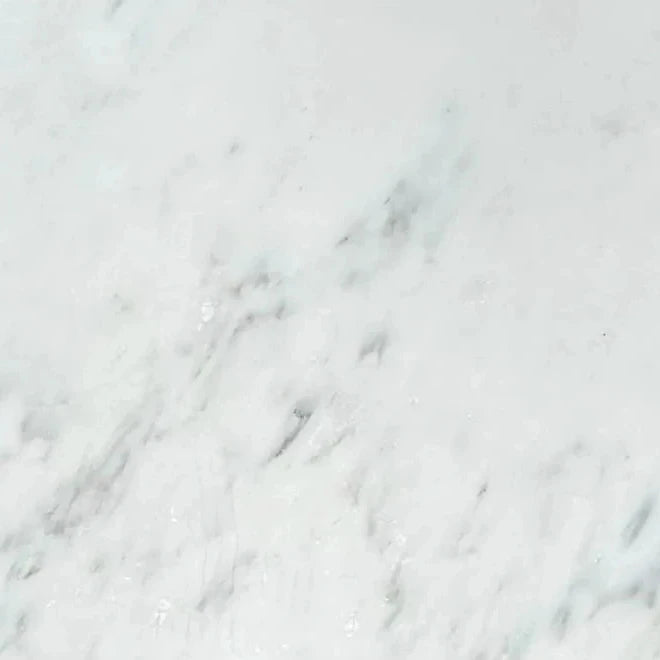 Oriental White honed 18×18 marble tile.