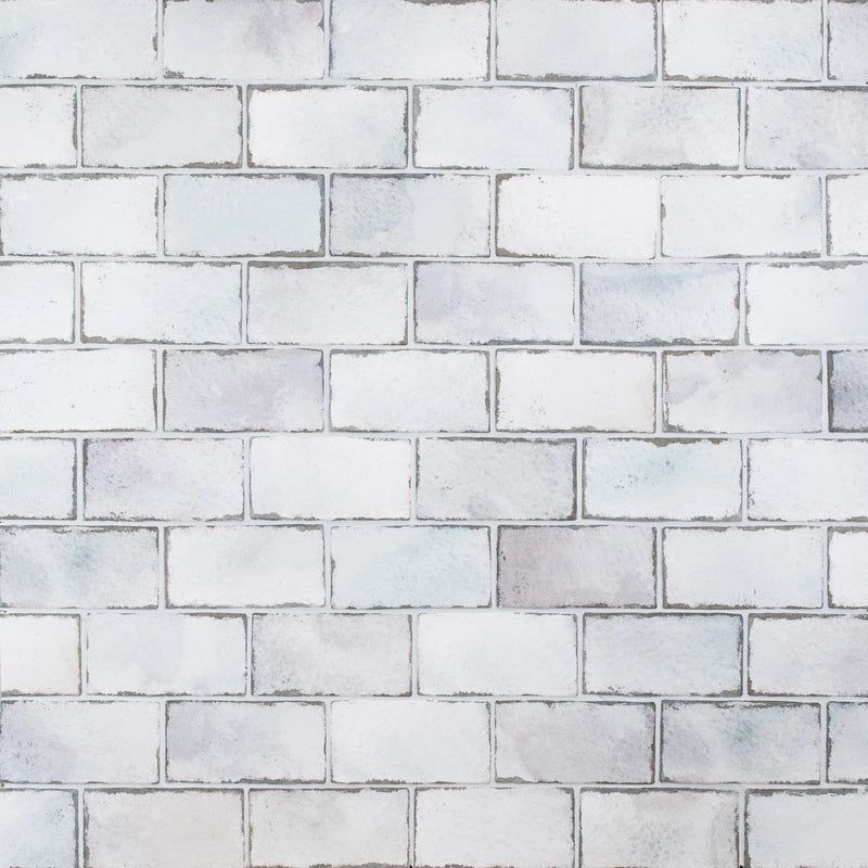 Retro Revival Soft Silver Mist 3×6 ceramic wall tile installed as a kitchen backsplash.