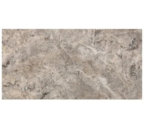 Silver Travertine 12×24 cross-cut honed-and-filled tile with cloudy silver-gray movement.