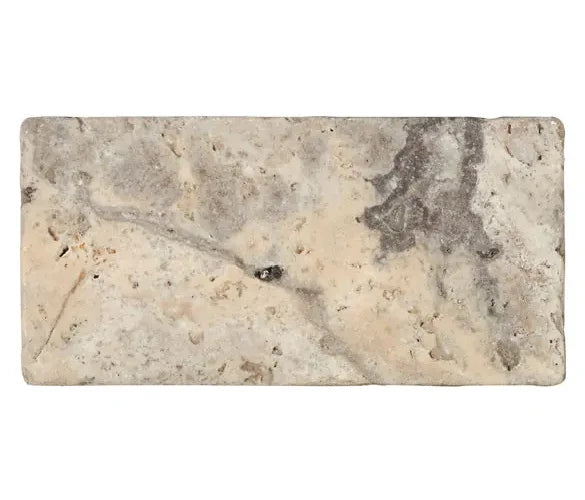 Silver Travertine 3×6 tumbled tile with softened edges and cool gray variation.