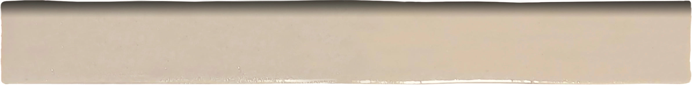 Zellige Charm Sandstone 1×8 semi-gloss ceramic bullnose trim.