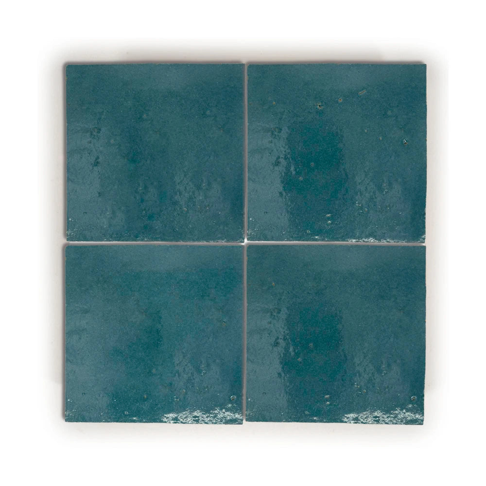 Azure Medina glossy handmade Moroccan Zellige 4×4 wall tile in a stacked layout.