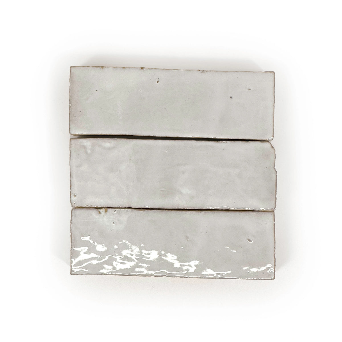 Casablanca White glossy handmade Moroccan Zellige 2×6 rectangular wall tile.
