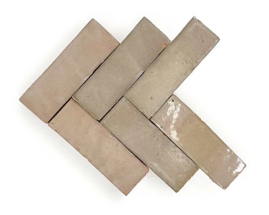 Desert Blush glossy handmade Moroccan Zellige 2×6 herringbone wall layout.