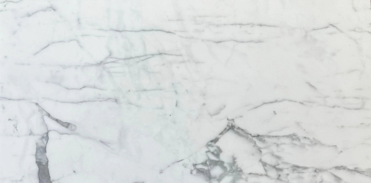 Classic Calacatta Gold marble from Italy with natural veining, bringing sophistication to tile and countertop applications.