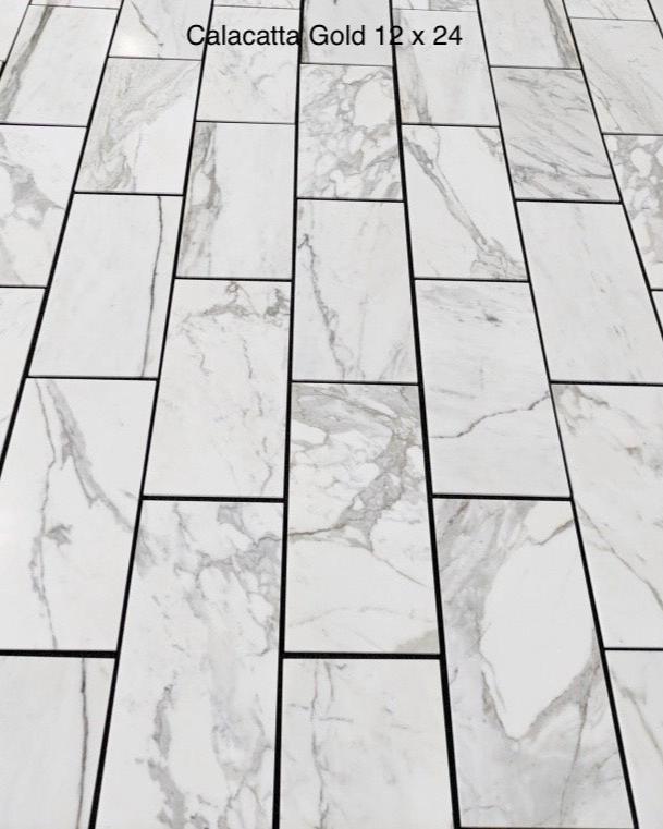 Calacatta Gold honed 12×24 inches marble tile.