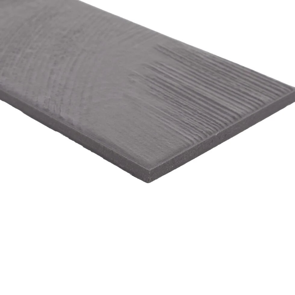 Stria Carbon Slate 3.5×7 porcelain tile edge detail showing the matte striated surface.