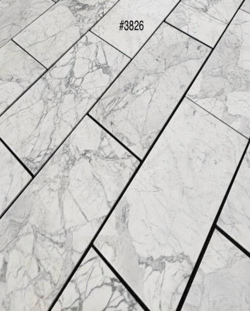 Statuary White marble 18×36 tile natural white and gray veining close-up.