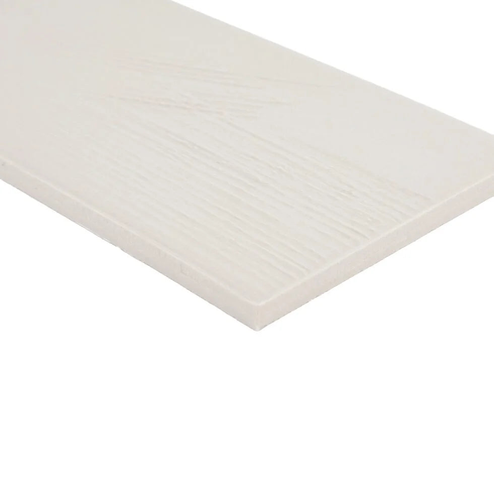 Stria Luna Plaster 3.5×7 porcelain tile edge detail showing the matte striated surface.