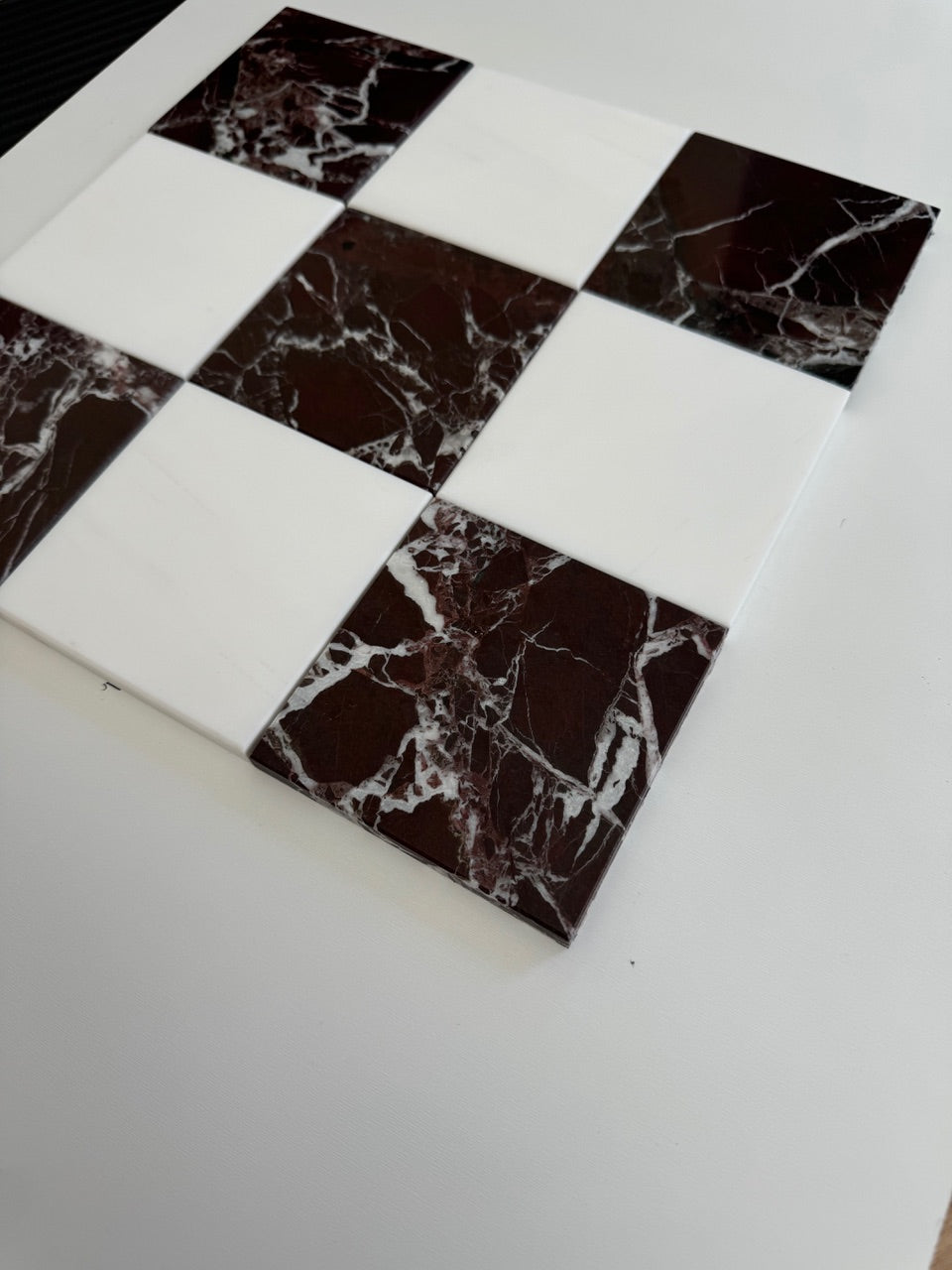 Rosso Levanto material reference for the checkerboard pairing.