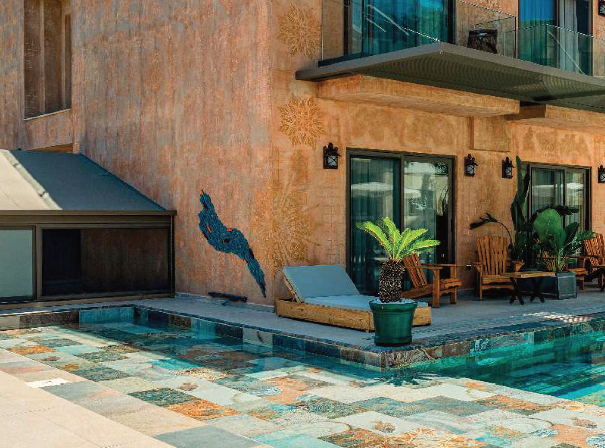 SeraPool Natural Fossil Mix porcelain pool tile installed in a finished pool project