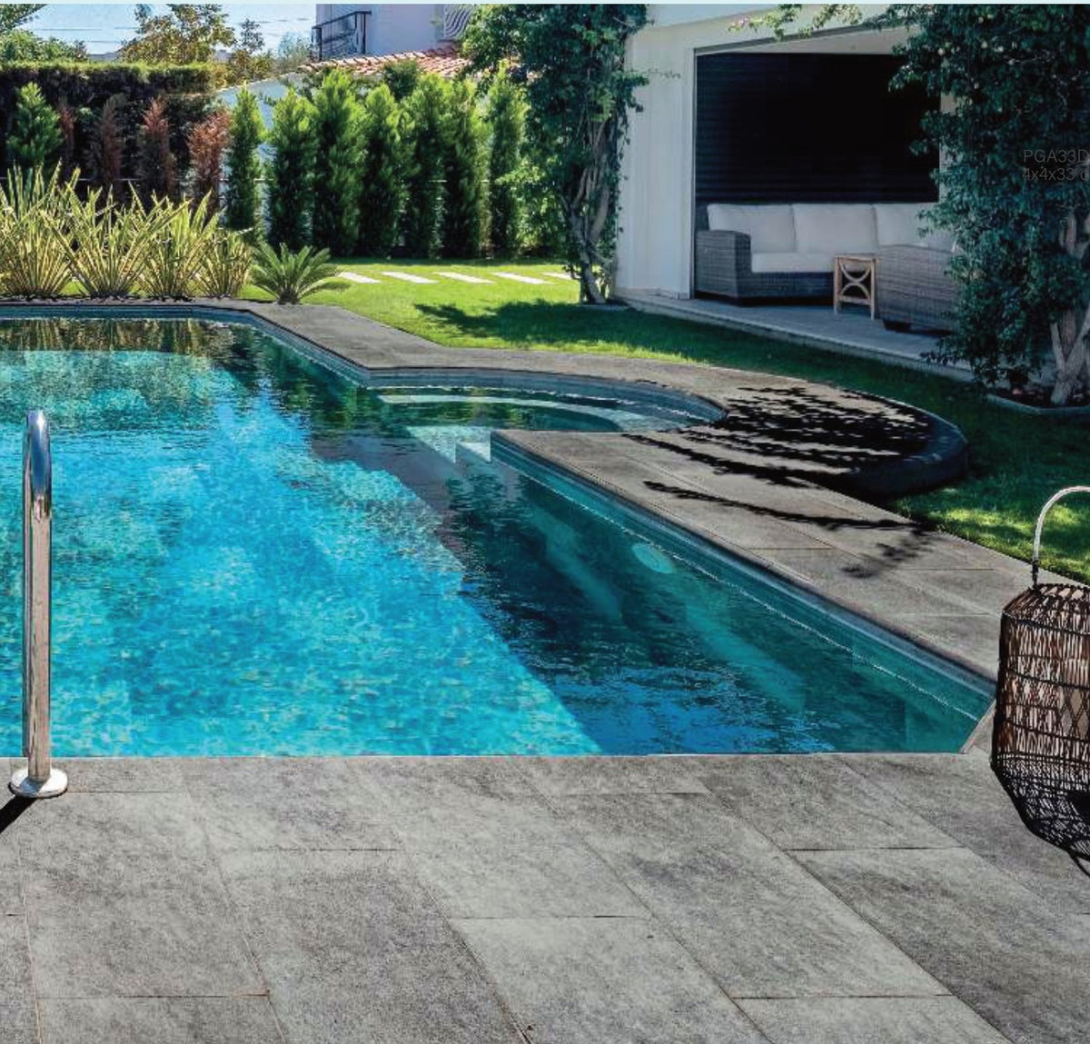 Pool Garden Anthracite porcelain pool deck and coping at the pool edge