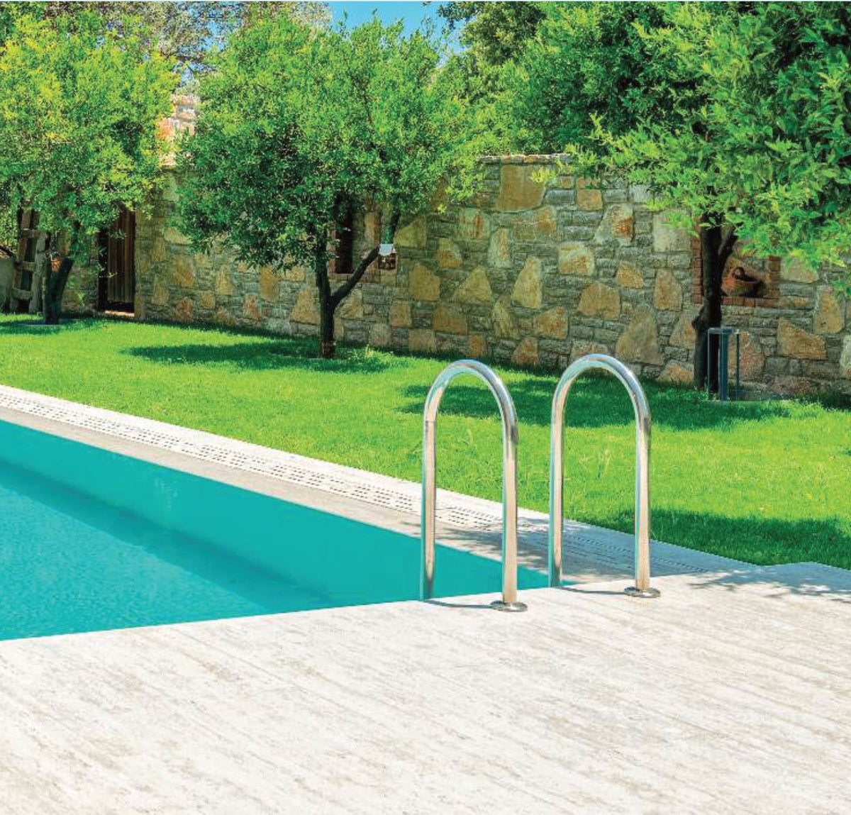 Silver Travertine porcelain pool deck and coping at the pool edge