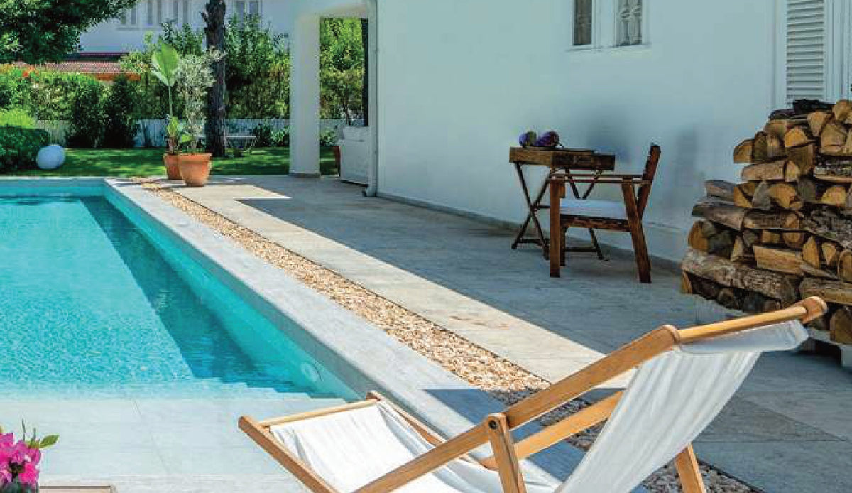 SeraPool Natural Snow White porcelain pool tile, close-up of a finished pool surface