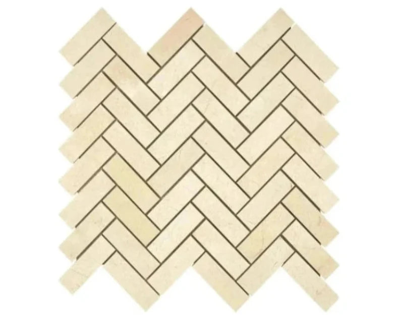 Crema Marfil 1×3 herringbone marble mosaic in polished or honed finish.