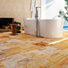 Bold Scabos Travertine with rich gold, red, and brown tones in tiles, mosaics, and liners. Perfect for walls, floors, and outdoor spaces.