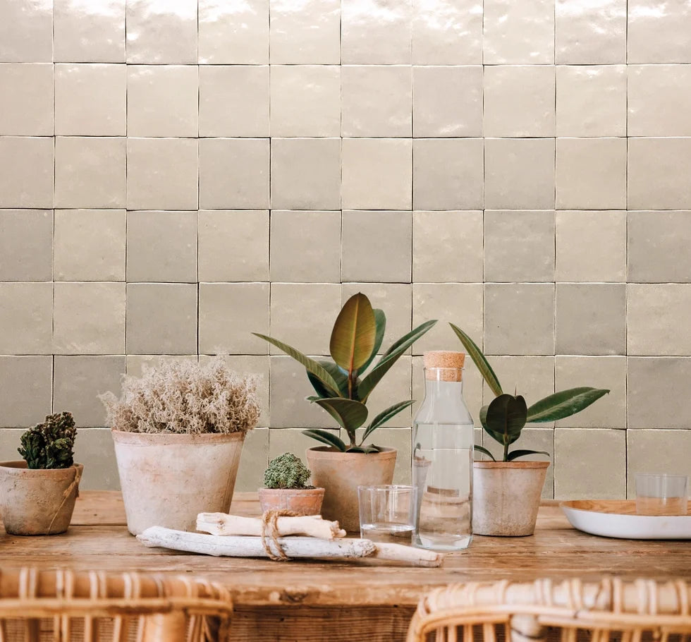Zellige Charm Desert Ivory 4x4 ceramic wall tile with soft glazed variation creating a handcrafted backsplash appearance.