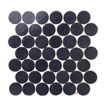 Indigo blue circular zellige mosaic tiles arranged in a grid pattern on a white background