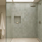 Aveline Celadon Mist 4×4 semi-gloss ceramic mosaic installed on an indoor shower wall