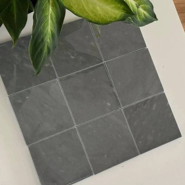 A close-up of Bardiglio Imperial marble tiles in a soft, blue-grey hue. Natural veining adds depth and character to the smooth, polished surface. Ideal for interior projects needing elegant marble tiles with a unique tone, making it perfect for bathrooms, kitchens, or accent walls