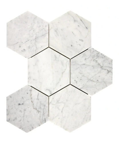 Bianco Carrara marble 5-inch hexagon mosaic tile with grey veining.