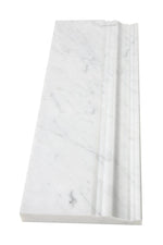 Bianco Carrara marble baseboard tile with polished finish and grey veining.